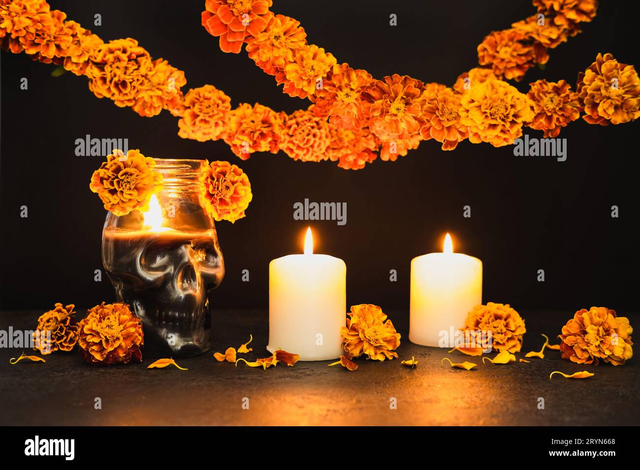 Burning candles, Skull with marigold flowers and garlands. Dia de los ...
