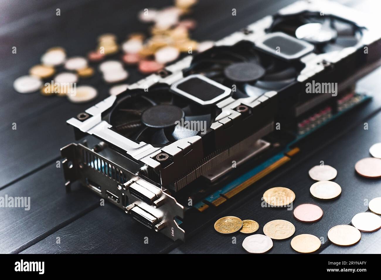 Cryptocurrency mining concept with bitcoins on a computer videocard Stock Photo