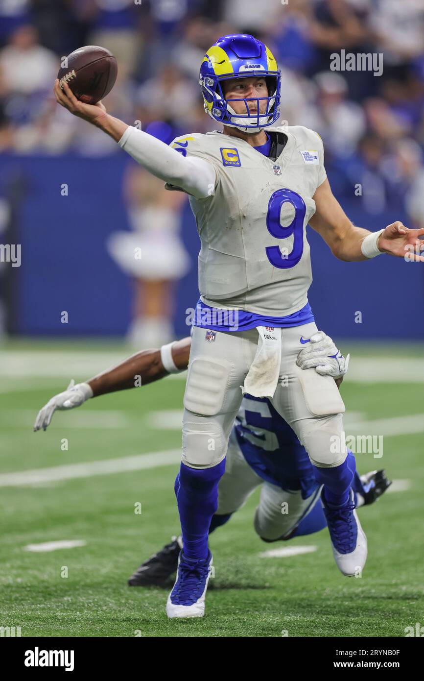 Indianapolis, IN USA;  Los Angeles Rams quarterback Matthew Stafford (9) scrambles out of the pocket and looks to pass during an NFL game against the Stock Photo