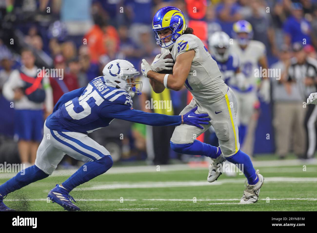 Indianapolis, IN USA;  Los Angeles Rams wide receiver Puka Nacua (17) makes a reception and runs to the end zone during an NFL game against the Indian Stock Photo