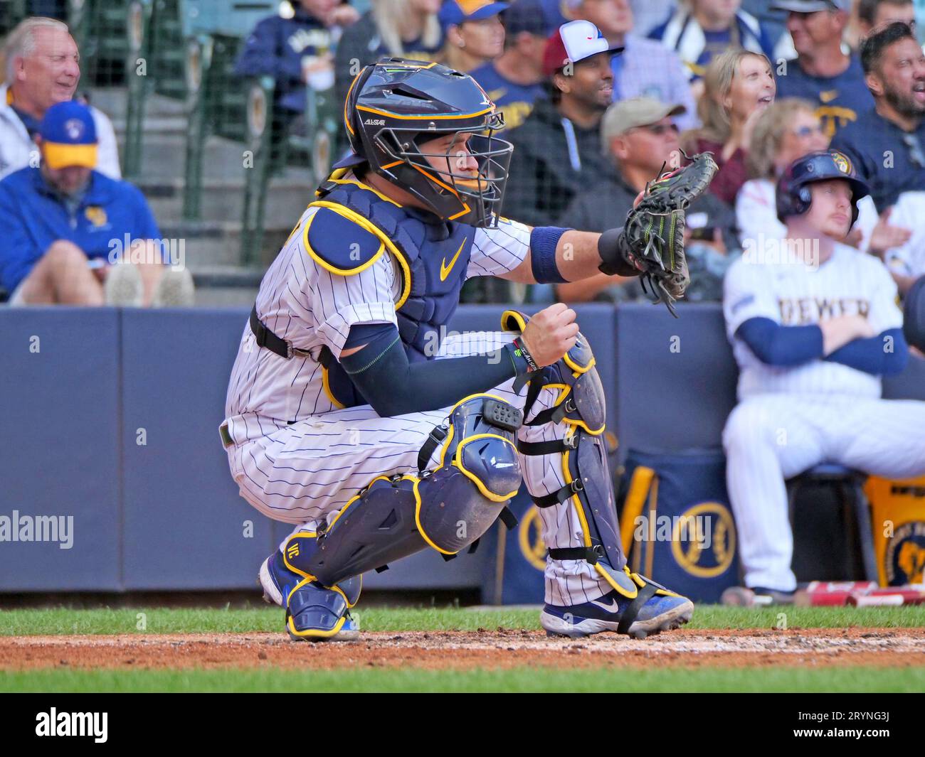 Milwaukee, WI USA; Milwaukee Brewers catcher Victor Caratini (7) behind