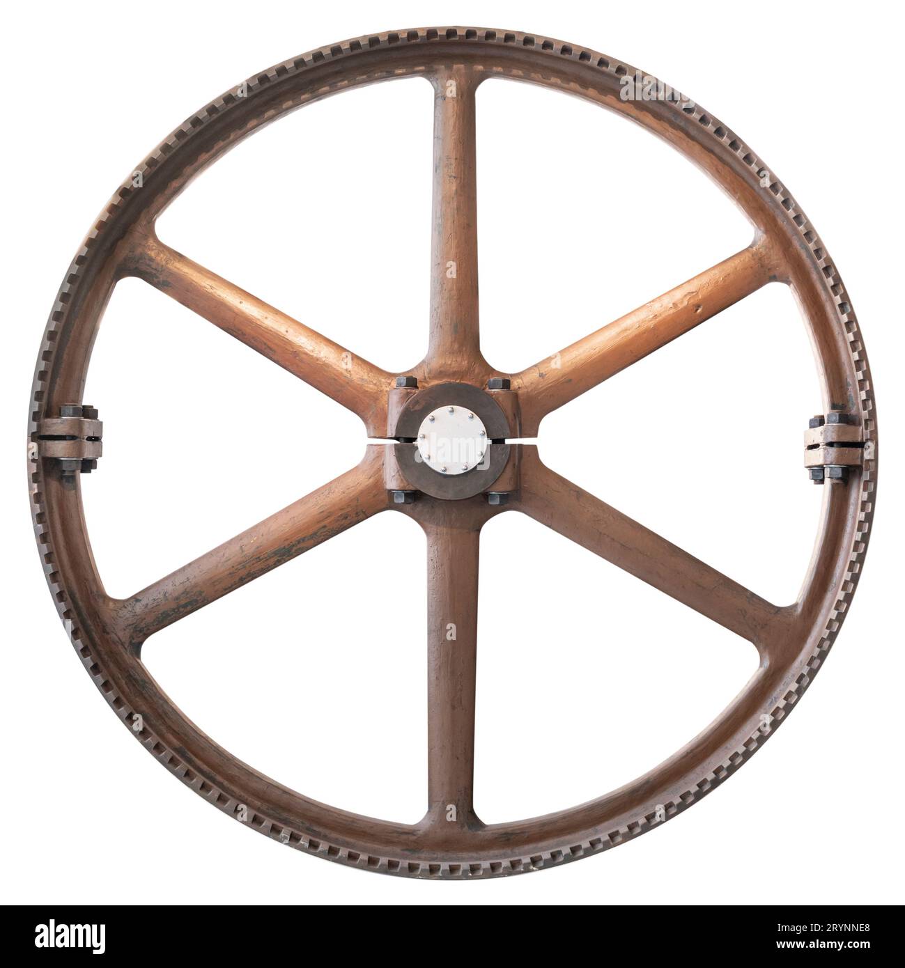 Old cast iron cogwheel isolated on white background. Antique Large gear wheel Stock Photo