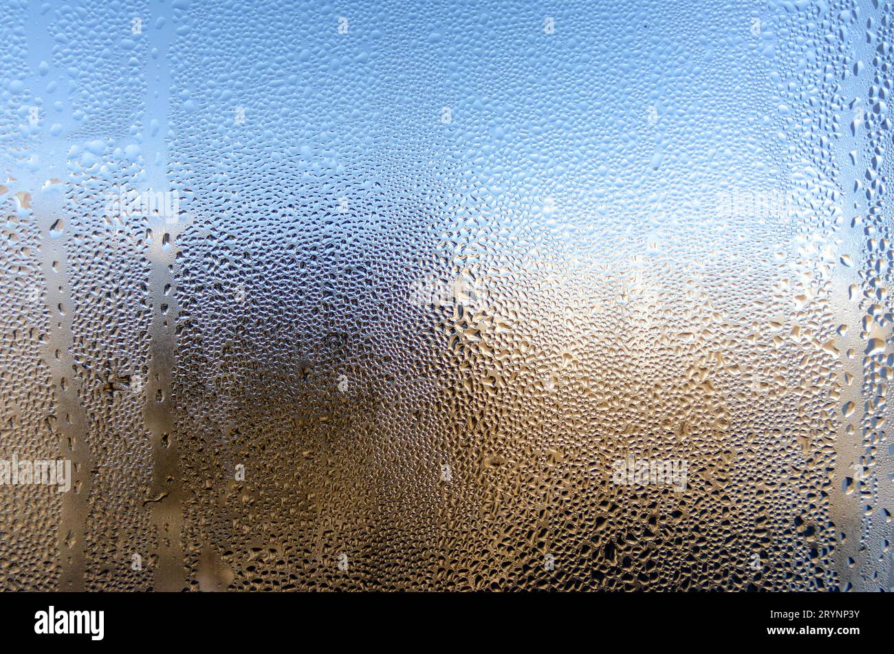 Water drops on glass surface close up Stock Photo