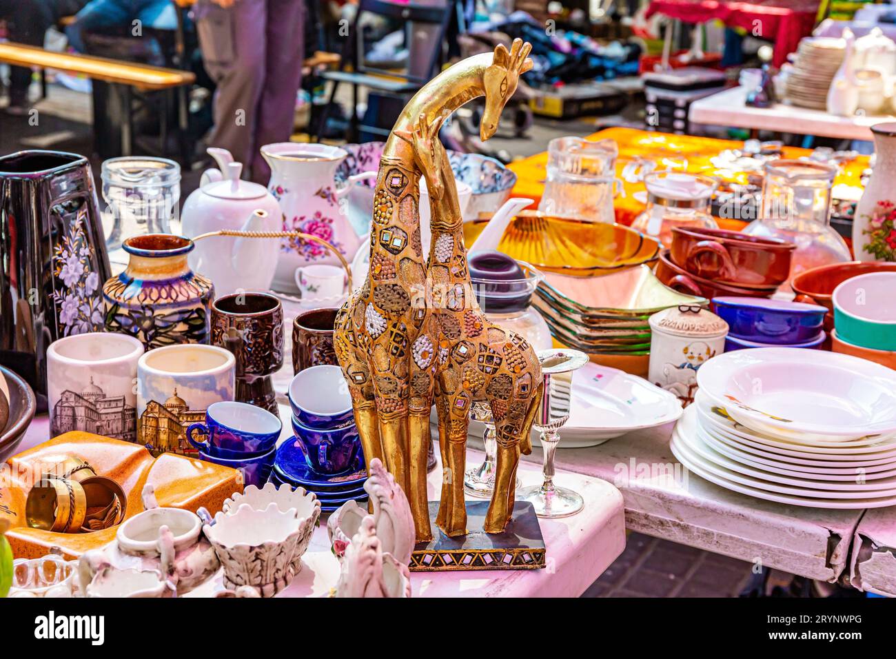 The bright spring sun illuminates the treasures on the bazaar stalls