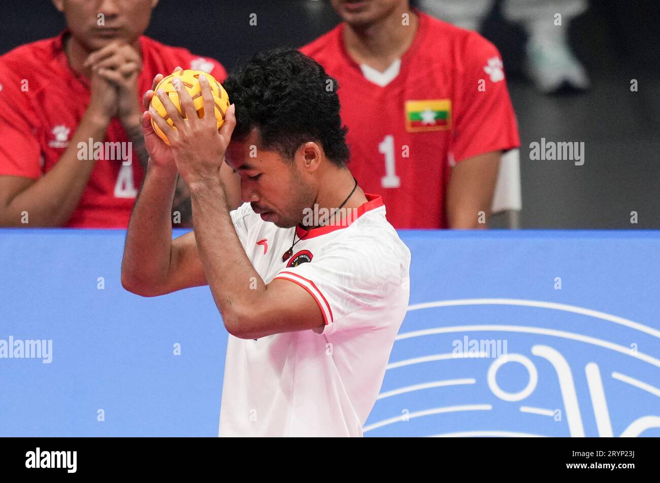 (231002) -- JINHUA, Oct. 2, 2023 (Xinhua) -- Saiful Rijal of Indonesia prepares to serve the ball during the Men's Quadrant Preliminary match of Sepaktakraw between Indonesia and Myanmar at the 19th Asian Games in Jinhua, east China's Zhejiang Province, Oct. 2, 2023. (Xinhua/Chen Zhonghao) Stock Photo