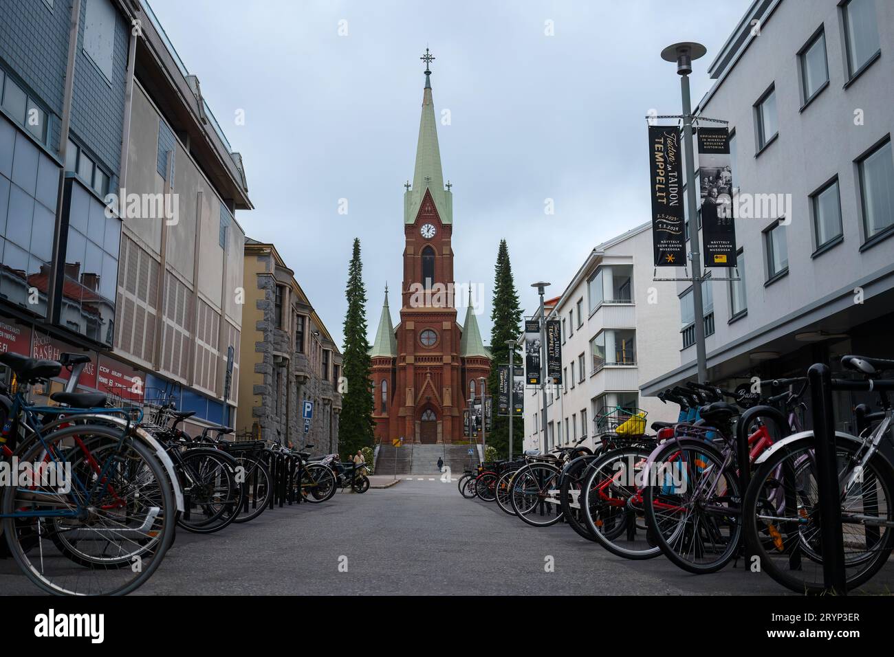 Mikkeli Cathedral seen from the street with bicycles parked on both sides. Mikkeli, Finland. September 11, 2023. Stock Photo