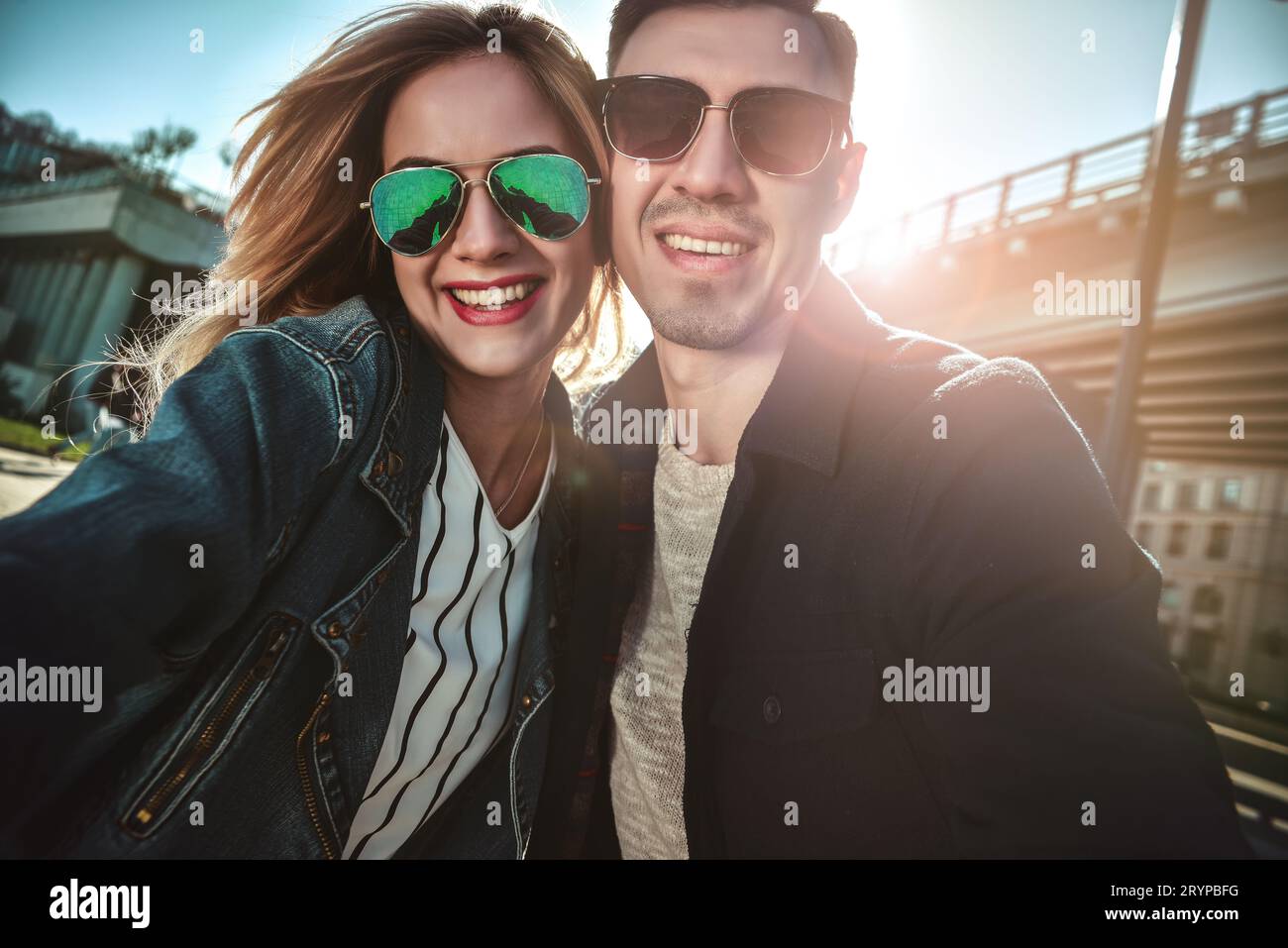 Happy young couple in love takes selfie portrait. Stock Photo