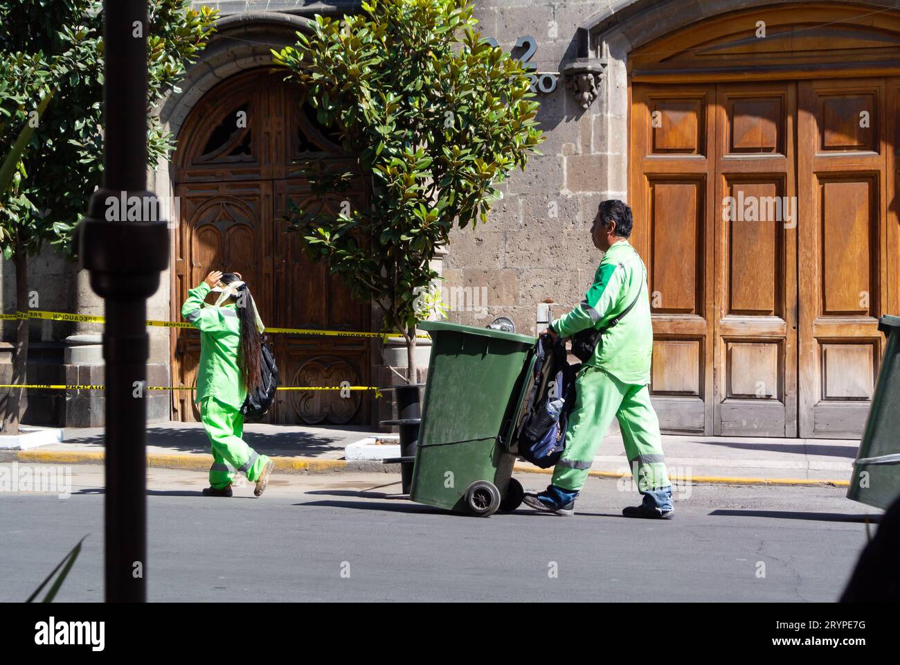 Mexico City, CDMX, Mexico, Garbage collectors working in the street of Mexico city. Editorial only. Stock Photo