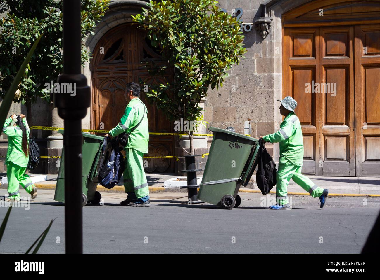 Mexico City, CDMX, Mexico, Garbage collectors working in the street of Mexico city. Editorial only. Stock Photo