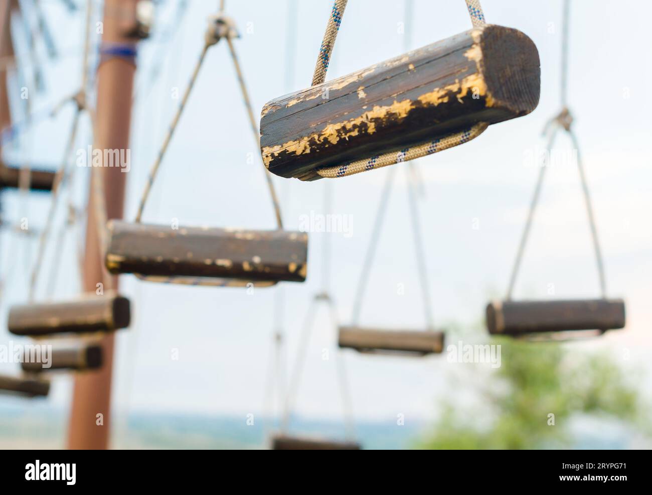 Small wooden logs of a suspended rope road close-up Stock Photo