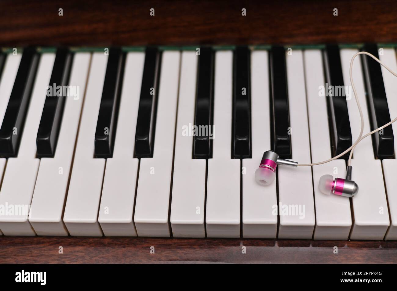 piano keyboard, headphones for listening to music Stock Photo Alamy