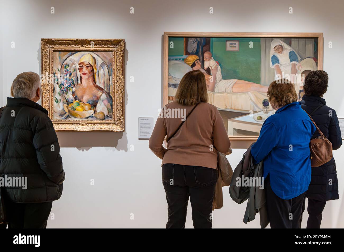 Visitors admiring modernist paintings at National Galleries of Scotland new extension, Edinburgh, UK Stock Photo