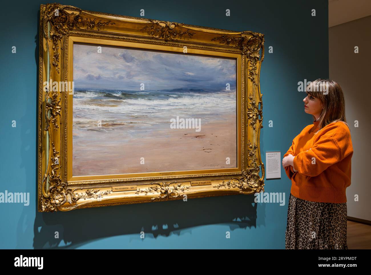 A woman admiring a William McTaggart painting at National Galleries of Scotland newly opened extension, Edinburgh, UK Stock Photo