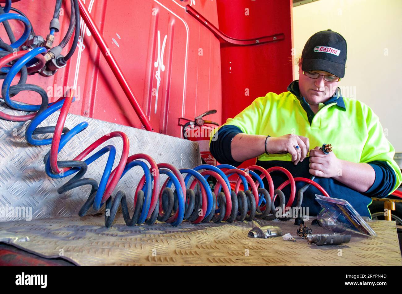 Breaking with tradition, a woman heavy vehicle motor mechanic in