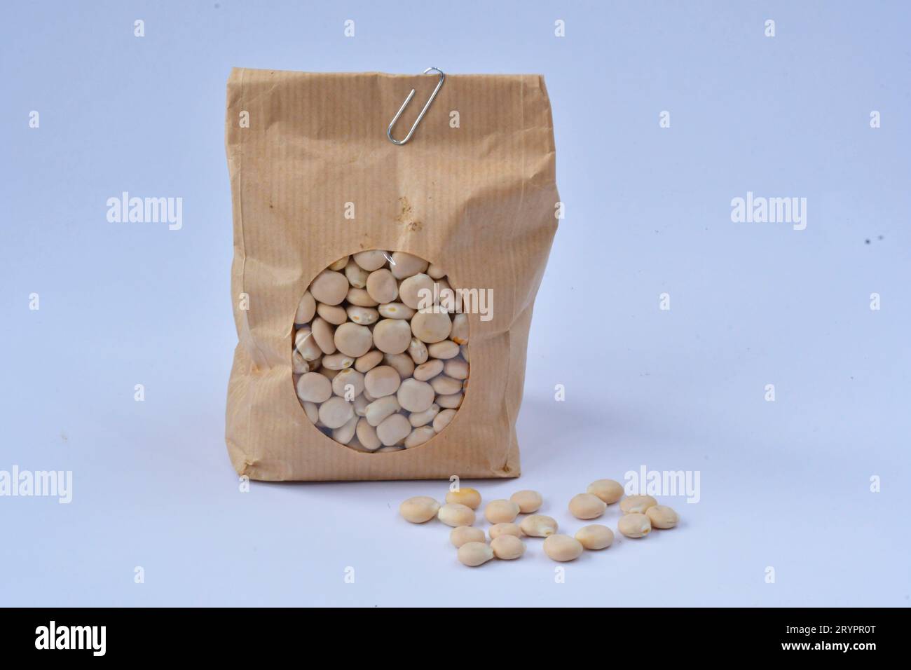 White Lupin, Field Lupine (Lupinus albus). Seeds (beans) in a bag. Studio picture Stock Photo