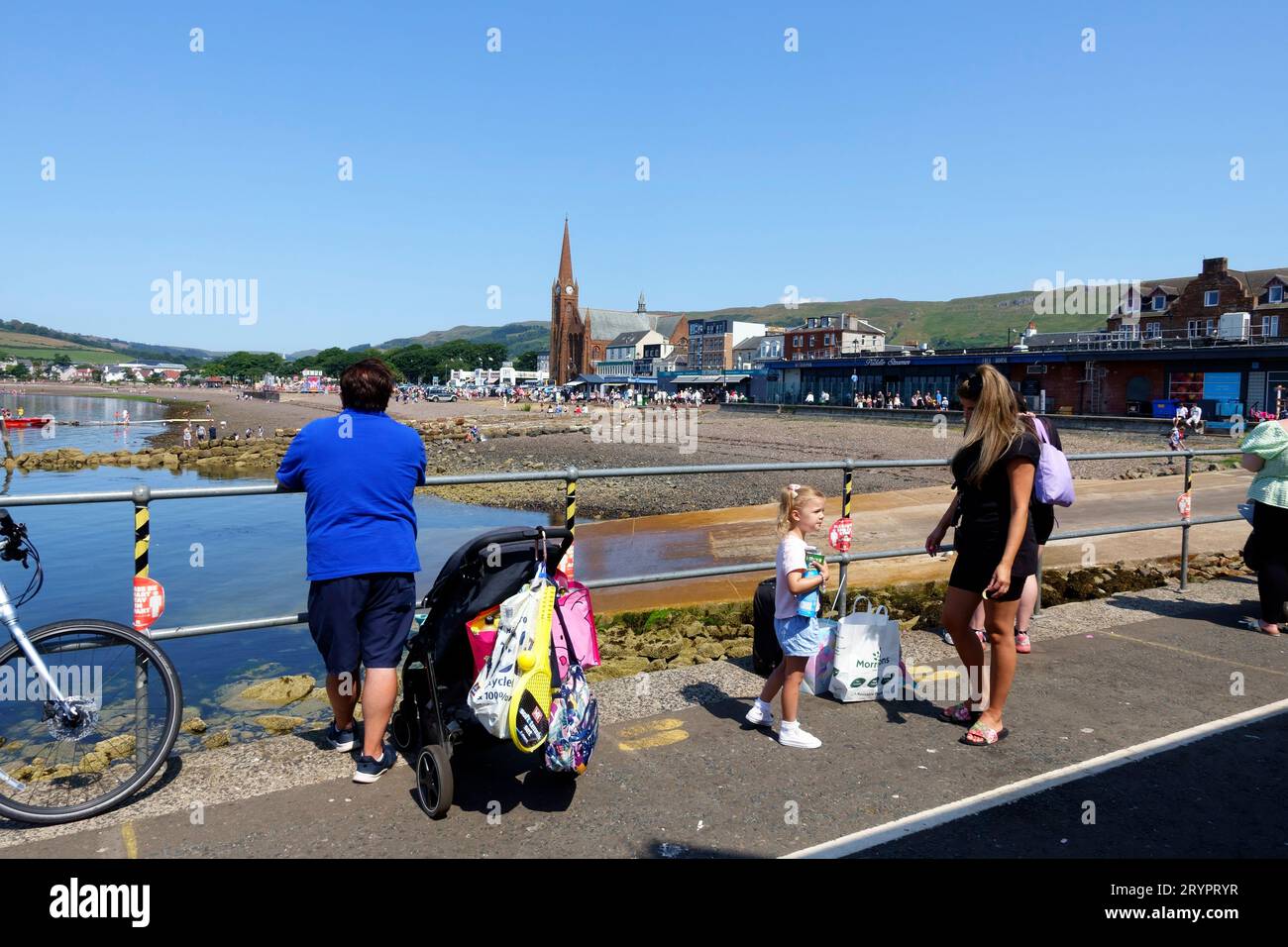 People queuing in Largs, Ayrshire, for the ferry to Cumbrae a popular Scottish Island. Stock Photo