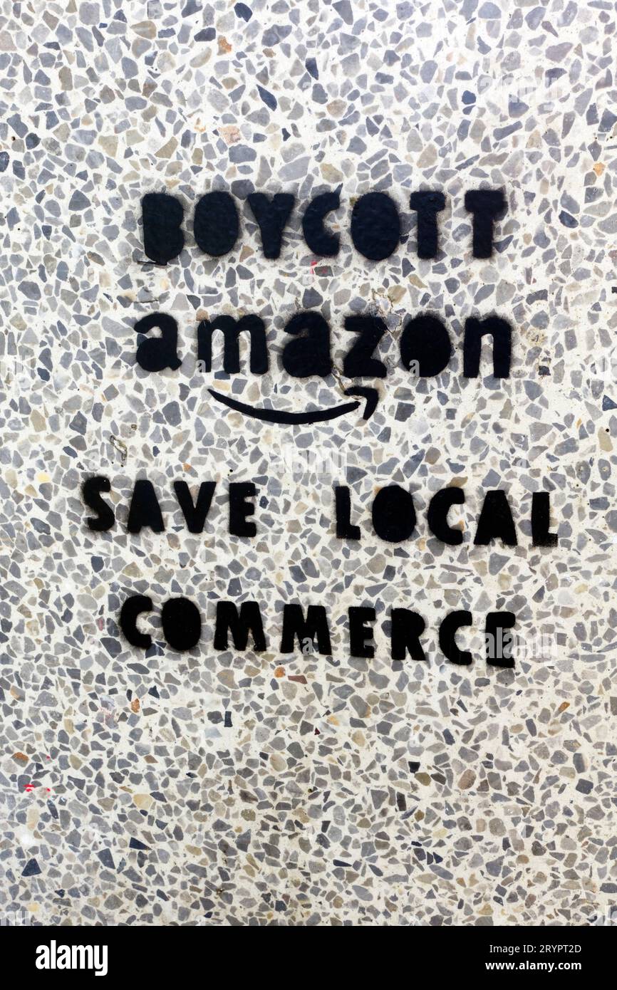 Boycott Amazon protest message stencilled onto a pavement in Brussels, Belgium Stock Photo