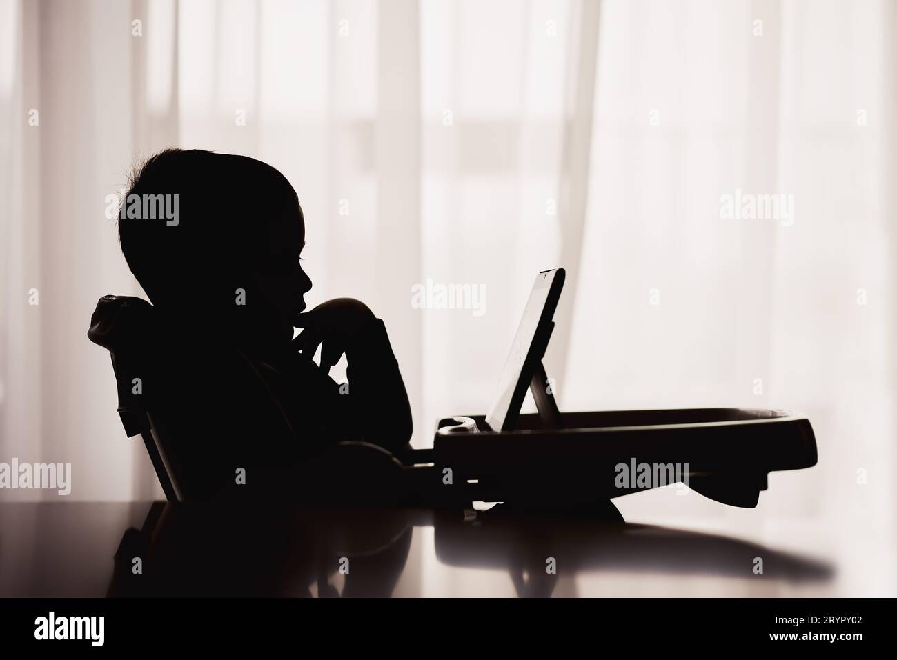 Baby boy  using digital tablet Stock Photo