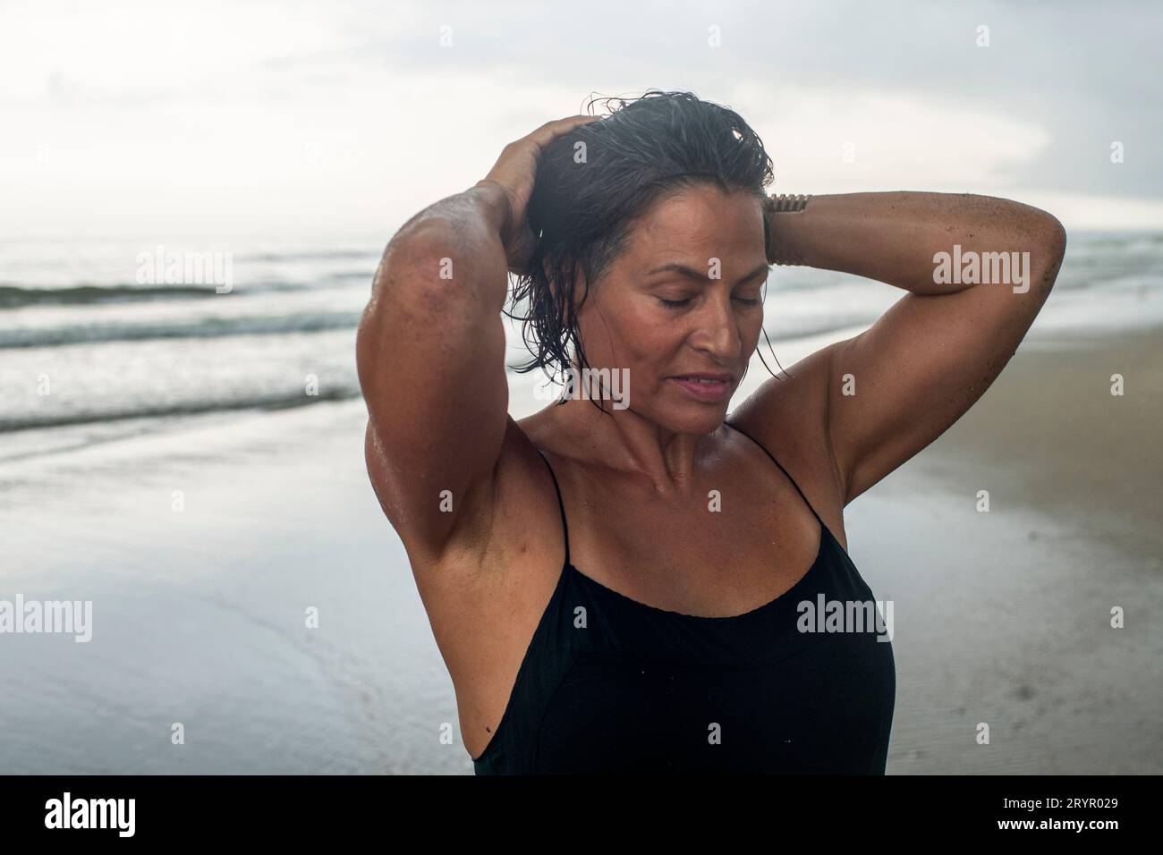 57-year-old-woman-at-the-beach-stock-photo-alamy