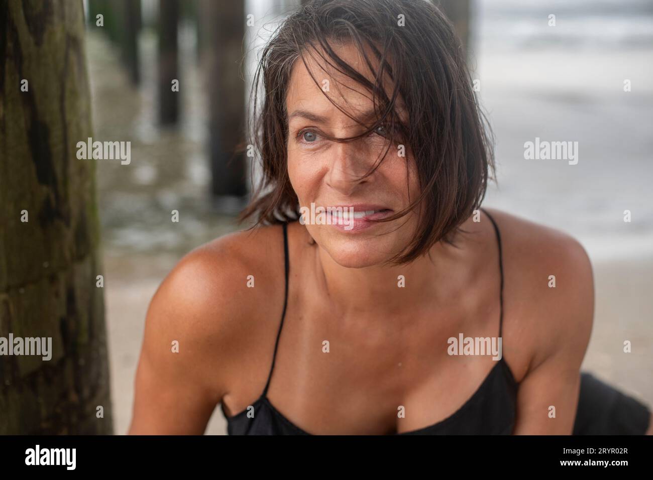 57-year-old-woman-at-the-beach-stock-photo-alamy