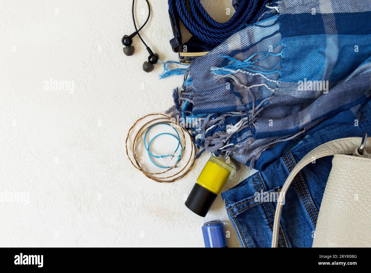 Flat lay Set of casual female clothes And accessories in blue to Stock Photo