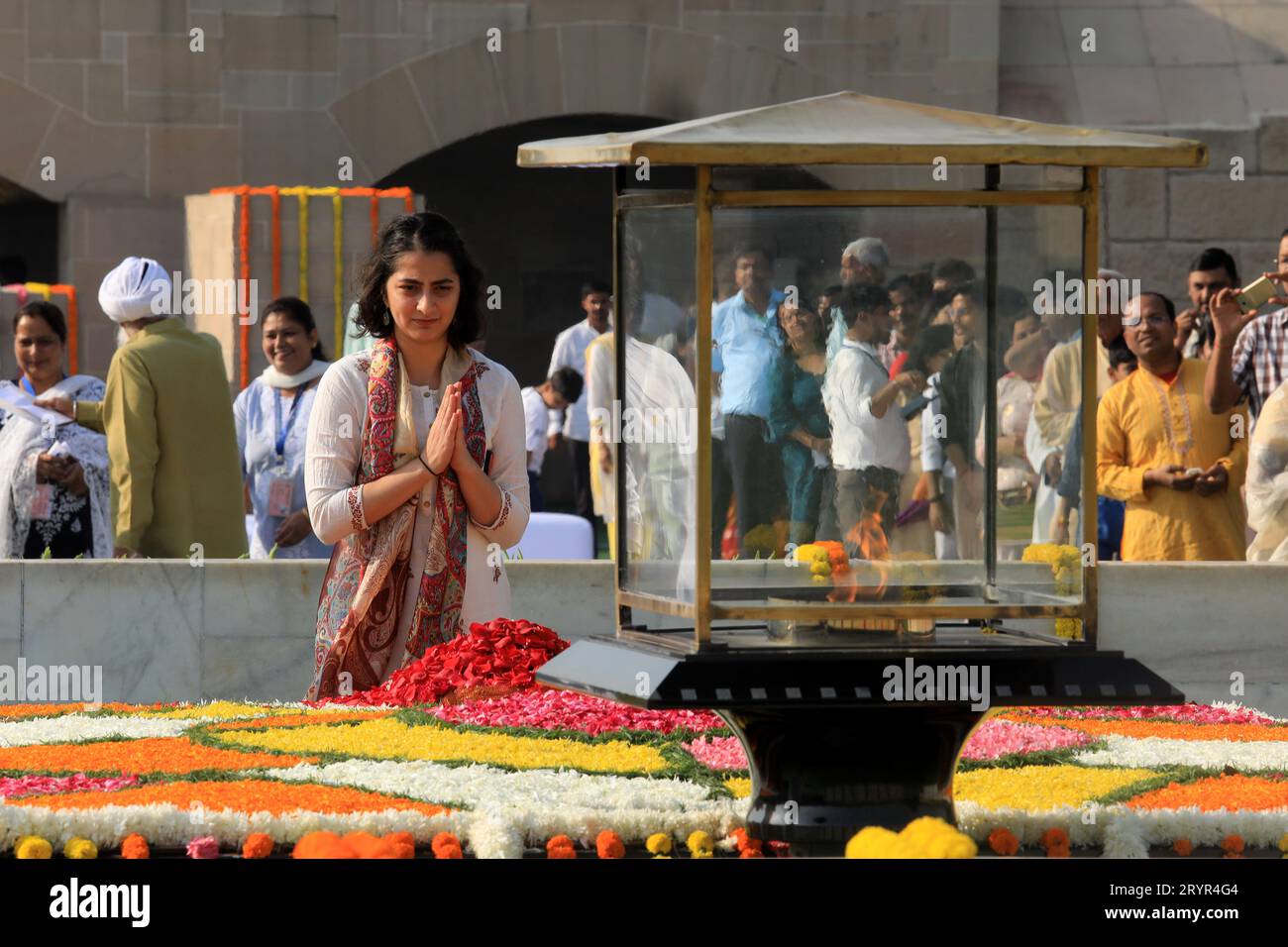 New Delhi, India. 02nd Oct, 2023. A woman pays her respects to Mahatma Gandhi on the occasion of his 154th birth anniversary at his memorial Rajghat. Gandhi Jayanti is celebrated every year on October 2nd. Mahatma Gandhi, also known as the Father of the Nation, Bapu or Mahatma, He play a key role in the India's freedom movement and demonstrated the power of Non-Violence. He inspired leader across the world with his values and principle. (Photo by Naveen Sharma/SOPA Images/Sipa USA) Credit: Sipa USA/Alamy Live News Stock Photo