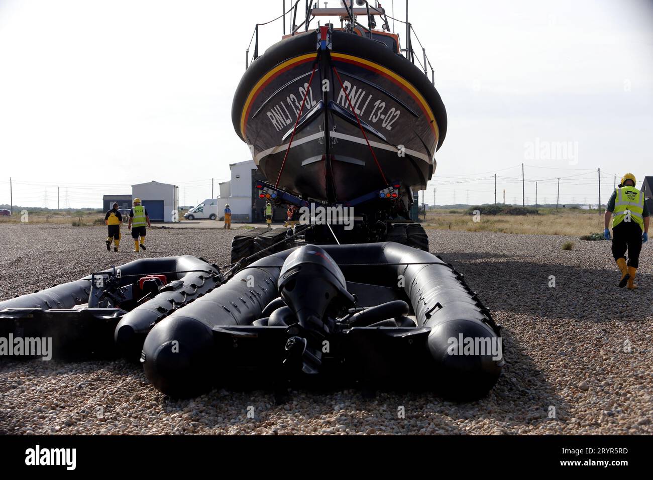 Dungeness, Kent, The RNLI retrieve small boats from the sea used by