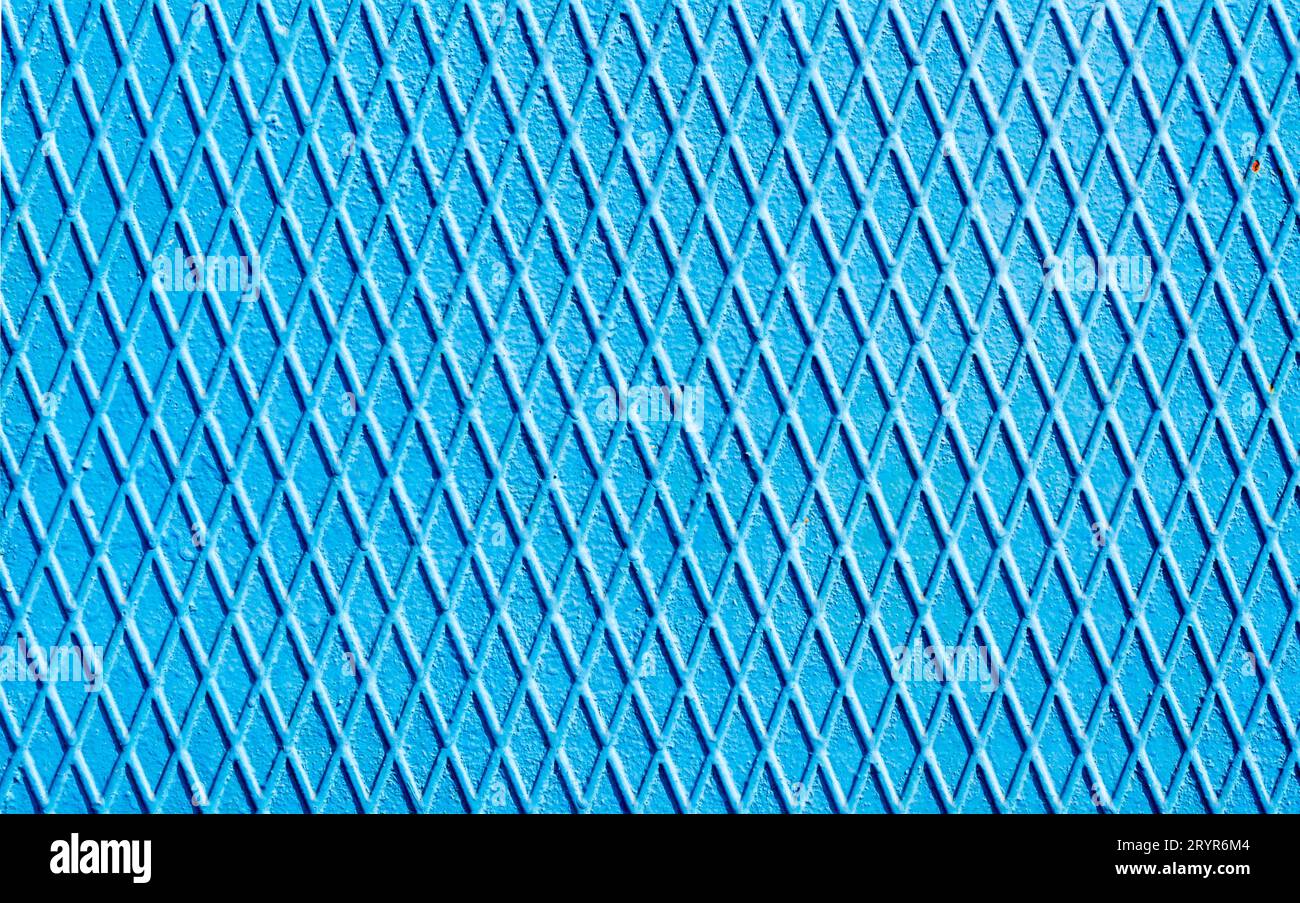 Blue iron wall with intersecting lines close up Stock Photo