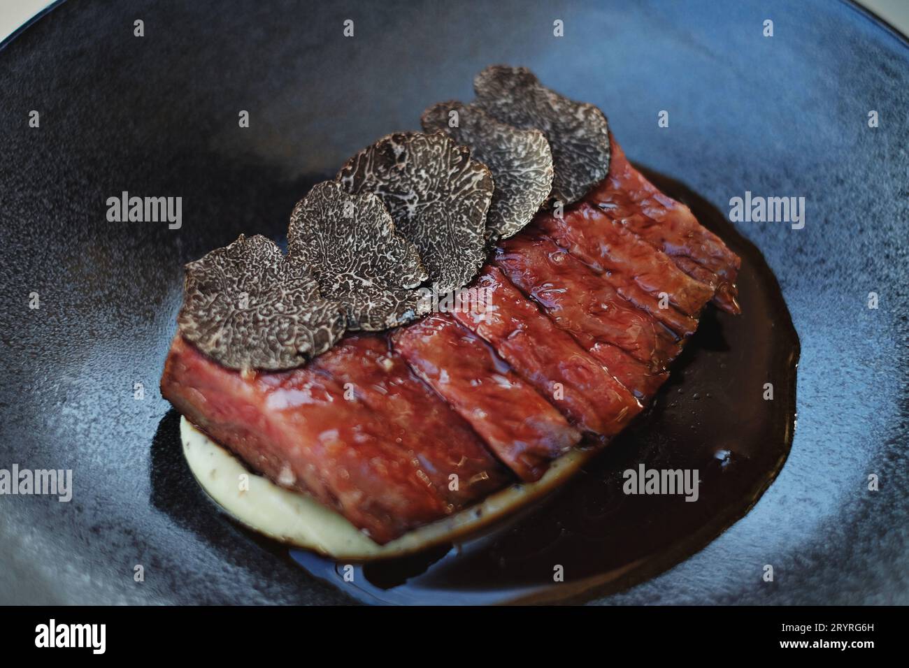 Close detail of the Blackmore Wagyu (9+) with slices of WA Truffle