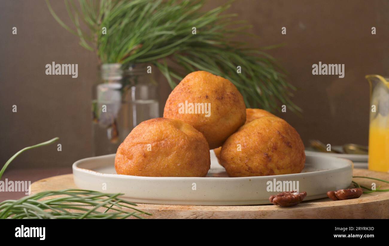 Traditional portuguese Christmas sweets Sonhos with sugar and cinnamon