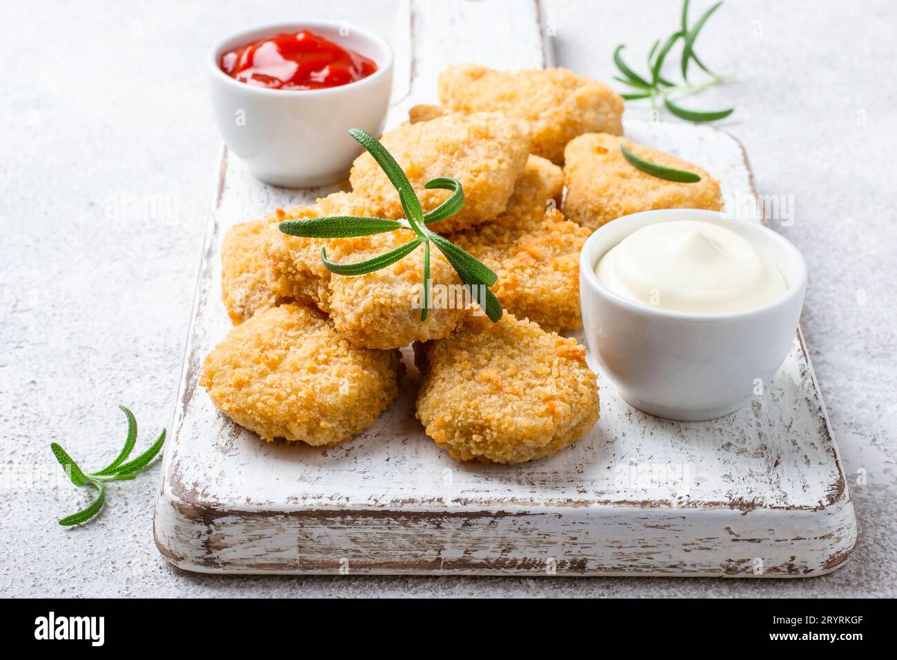 Fried Crispy Chicken Nuggets With Popular Sauces Stock Photo Alamy fried-crispy-chicken-nuggets-with-popular-sauces-stock-photo-alamy