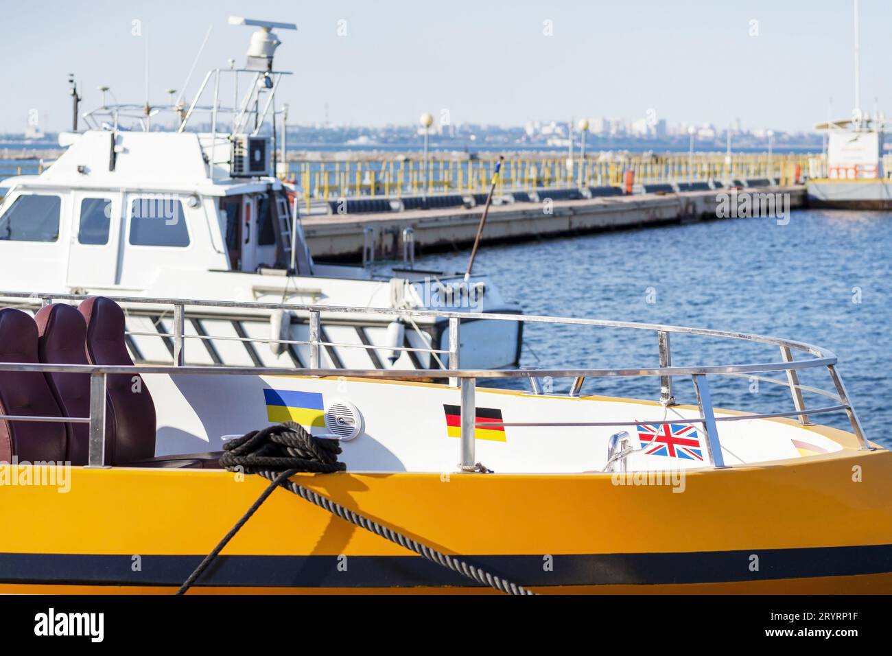 Walking on jetty moored boats hi-res stock photography and images - Alamy