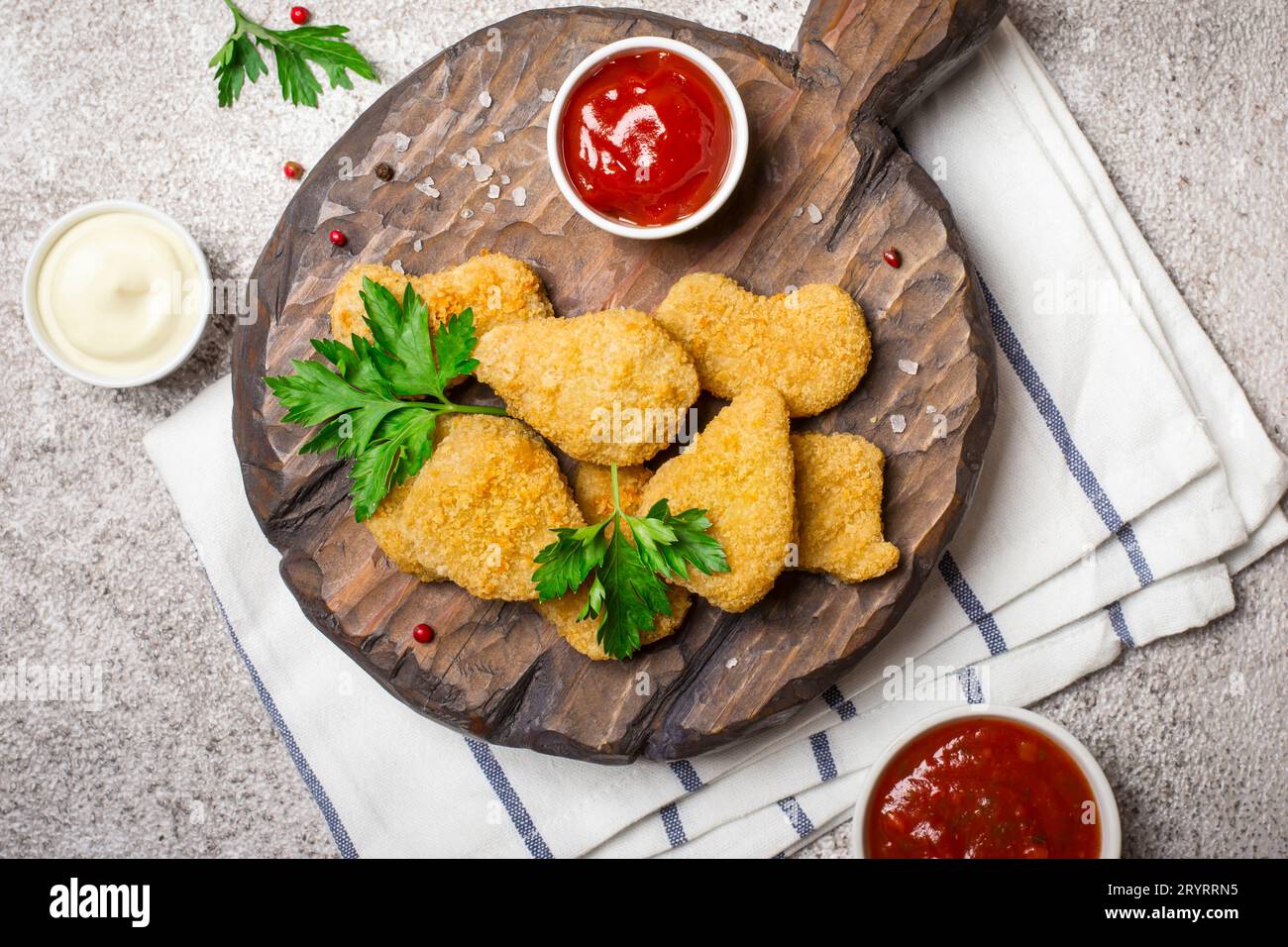 Fried Crispy Chicken Nuggets With Popular Sauces Stock Photo Alamy fried-crispy-chicken-nuggets-with-popular-sauces-stock-photo-alamy