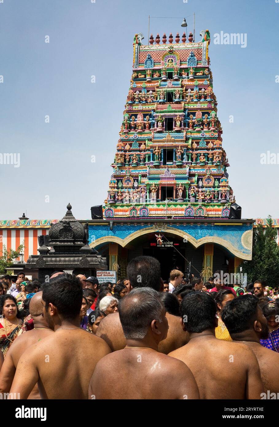 Hindus at the temple festival in front of the Hindu temple Sri Kamadchi