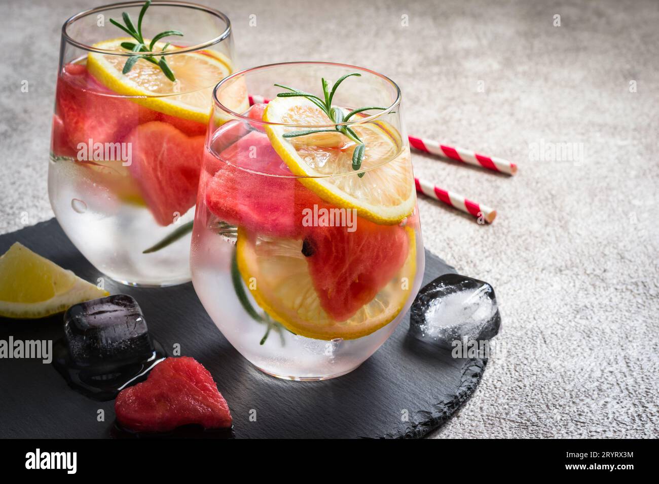 Watermelon lemon cocktail with pieces of watermelon in shape of heart. Valentine's Day Concept Stock Photo