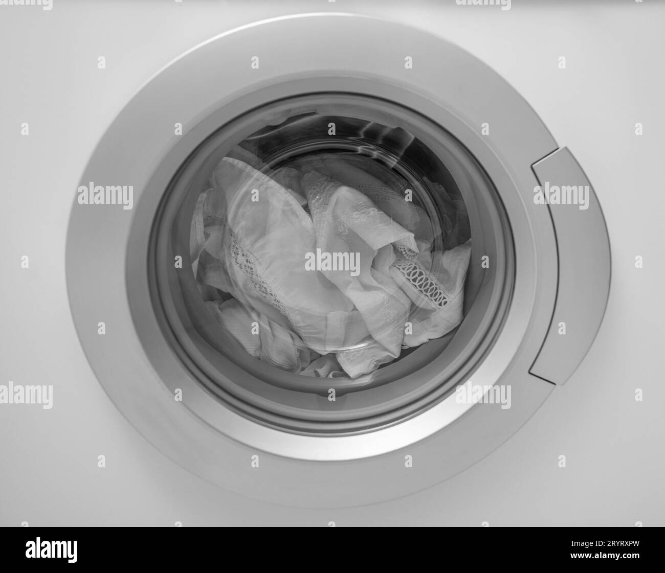 White Clothes In The Washing Machine Stock Photo Alamy white-clothes-in-the-washing-machine-stock-photo-alamy