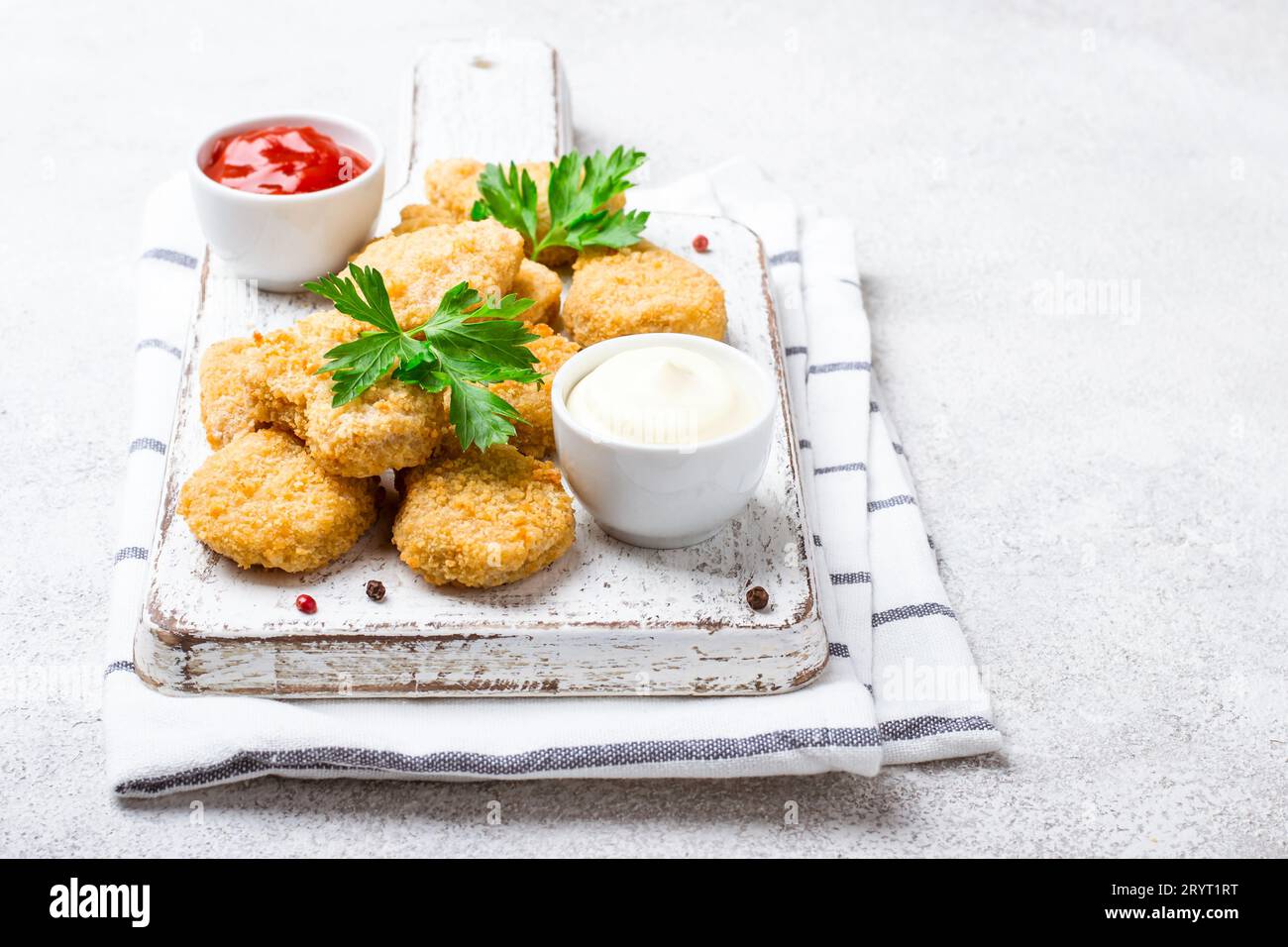 Fried Crispy Chicken Nuggets With Popular Sauces Stock Photo Alamy fried-crispy-chicken-nuggets-with-popular-sauces-stock-photo-alamy