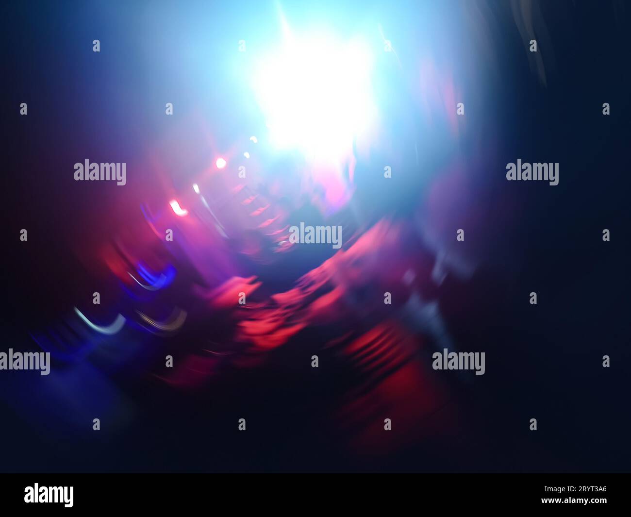 Bright colorful stage lights blur backdrop. Stage lights on concert. Stock Photo