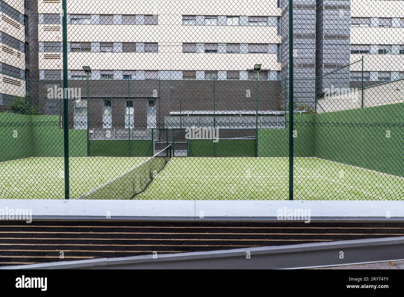 Padel court closed with metal fences Stock Photo - Alamy