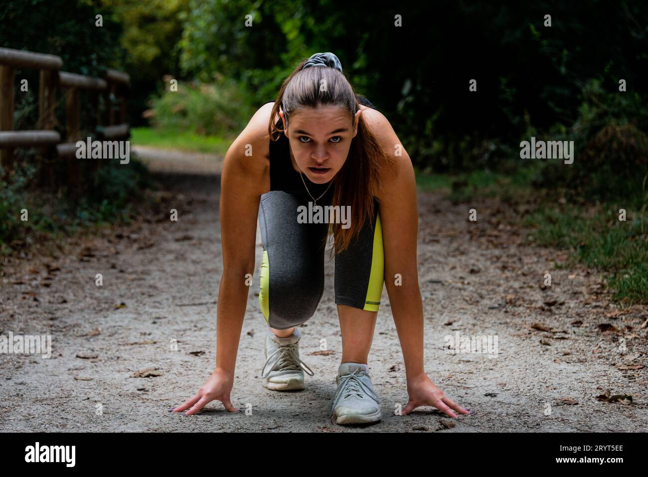 young woman ,ready for her run in the countryside ,training ,keep fit , hobbys and pastimes . Stock Photo