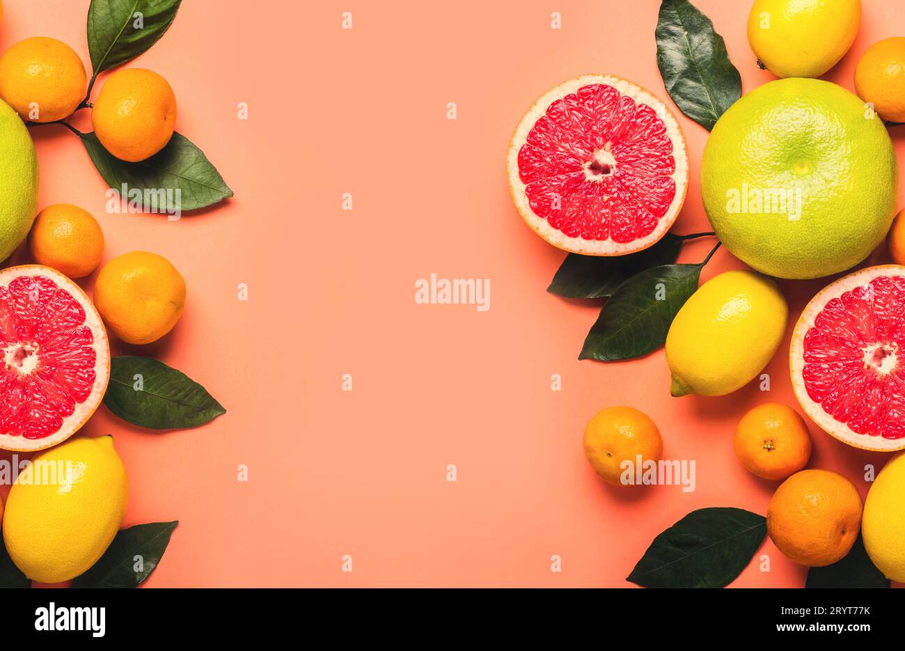Healthy food background. Citrus fruit with leaves. Living coral