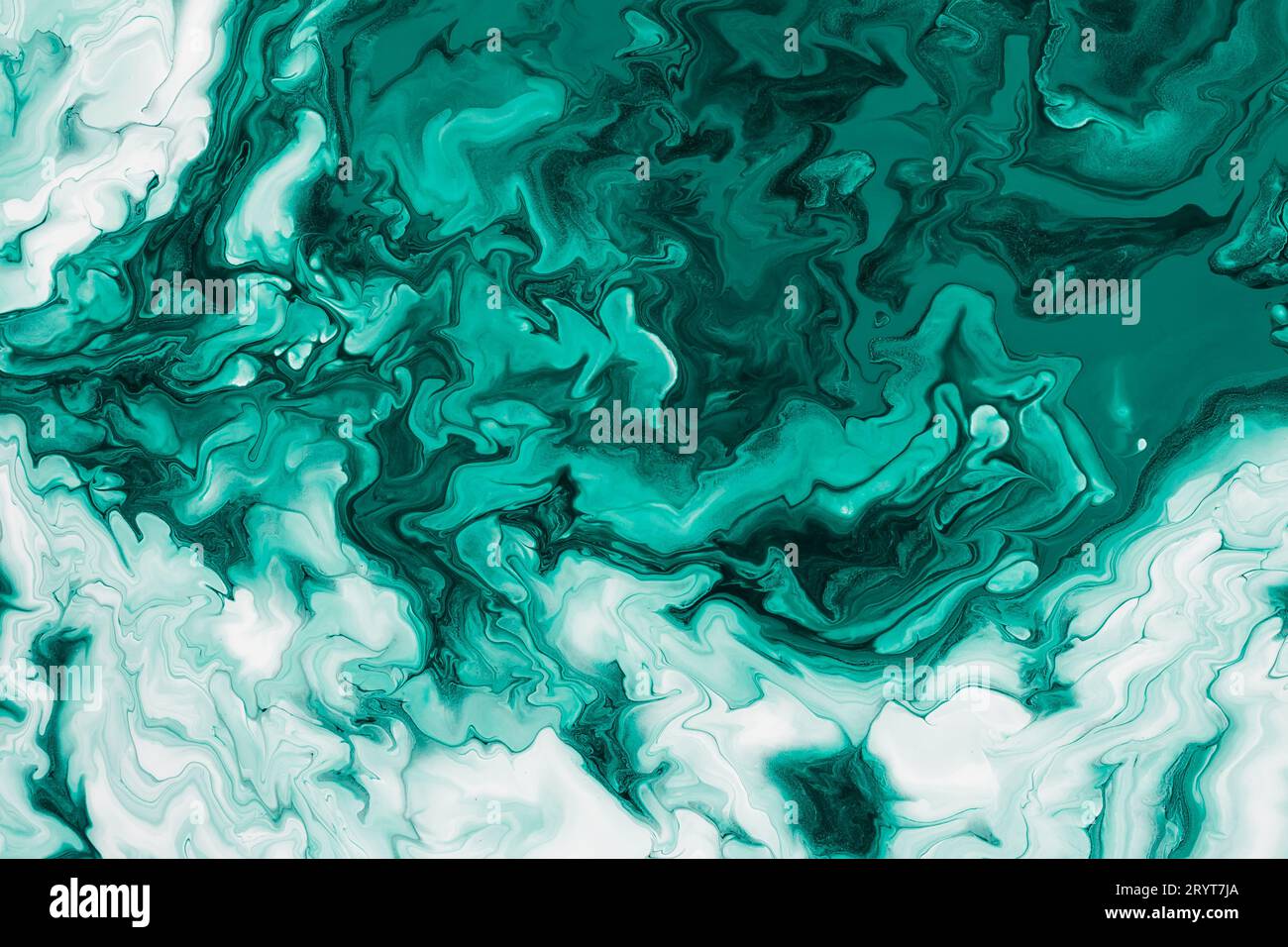 Abstract marble background or texture. Free flowing green and white acrylic paint. Random Waves and Curls Stock Photo