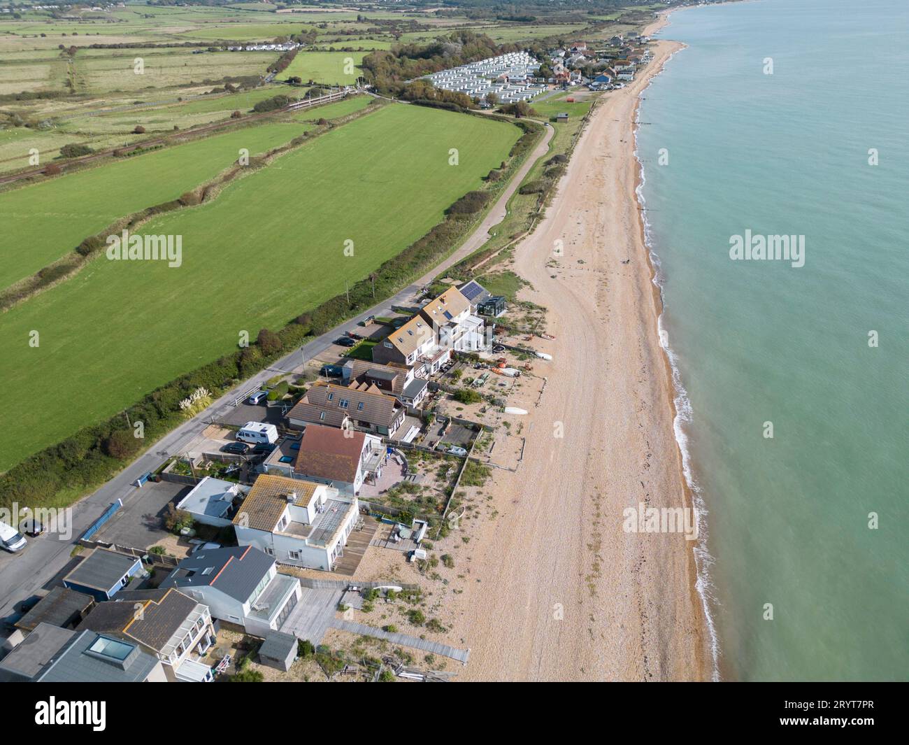 aerial view of houses on the beach at Normans bay in East Sussex Stock