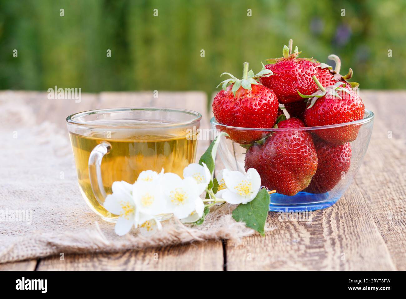 Ripe strawberries glass strawberry hi-res stock photography and images ...