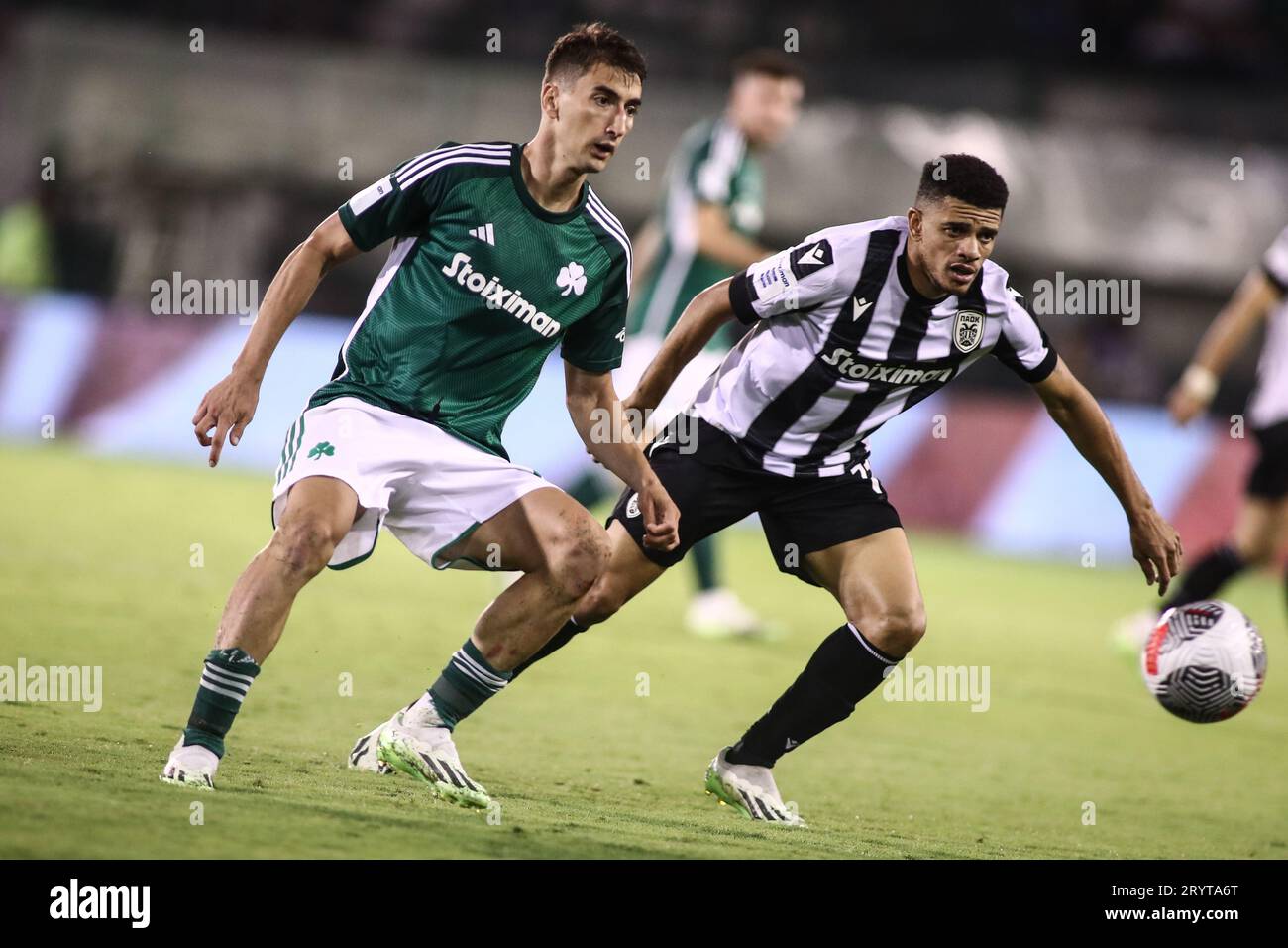 Athens, Greece. 1st Oct, 2023. Panathinaikos player Filip Djuricic (Left) and PAOK's Taison (Right) fight for the ball during a Greek Superleague game between Panathinaikos FC and PAOK FC. The game ended up 2-2. (Credit Image: © Giannis Papanikos/ZUMA Press Wire) EDITORIAL USAGE ONLY! Not for Commercial USAGE! Stock Photo
