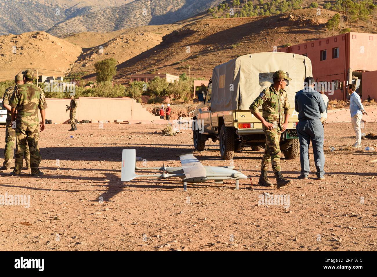 Amizmiz, Morocco - 10 September 2023: a military drone aircraft is seen on the ground being operated by military personnel in the desert Stock Photo