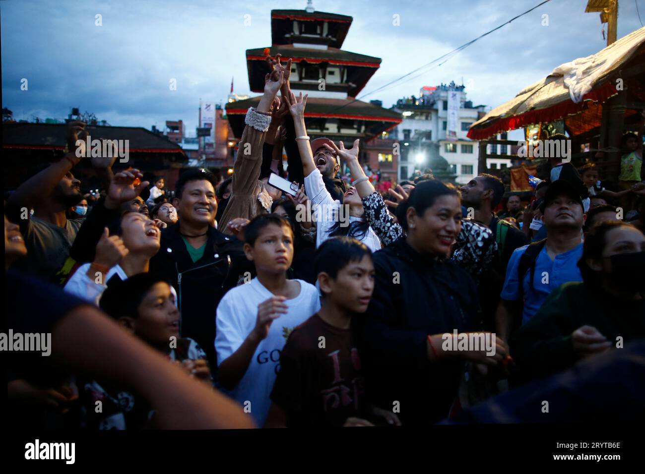 Kathmandu, Nepal. 2nd Oct, 2023. Devotees collect offerings from the
