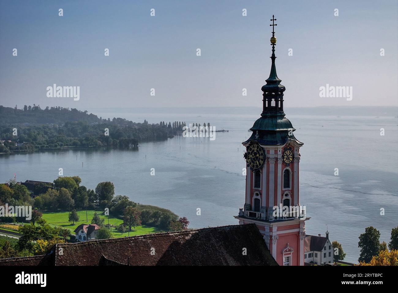 Unteruhldingen Birnau, Germany. 02nd Oct, 2023. Lake Constance lies in a haze behind the former Birnau monastery church. Credit: Felix Kästle/dpa/Alamy Live News Stock Photo