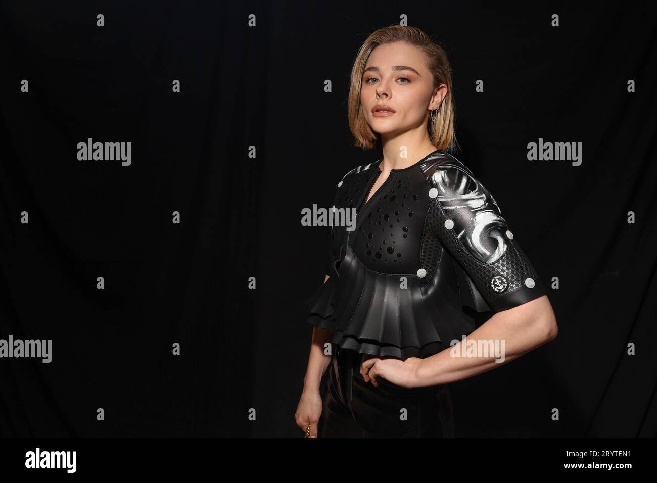 chloe grace moretz attends the louis vuitton womenswear fall-winter 2022- 2023 show during paris fashion week in paris, france-070322_6