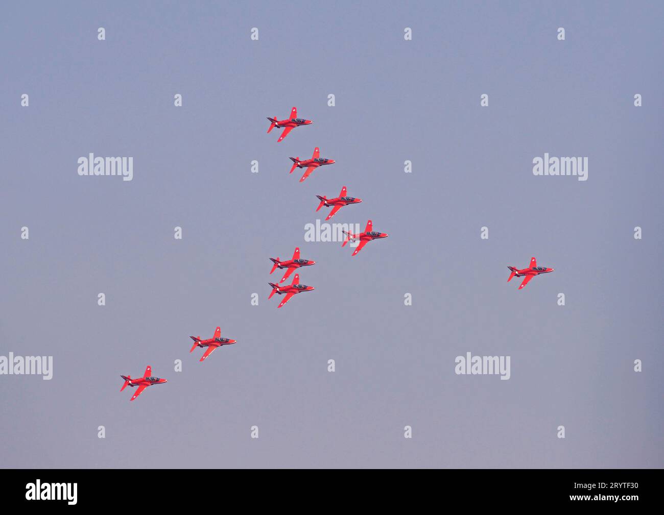 The RED ARROWS flying over Liverpool John Lennon Airport in formation en route to BLACKPOOL, their base for the SOUTHPORT AIRSHOW Stock Photo